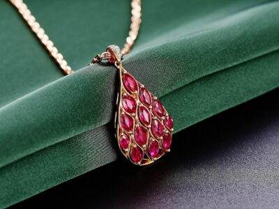 Gold Pendant With Ruby Studs