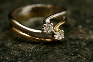 Elegant Gold Ring With Diamond Accents