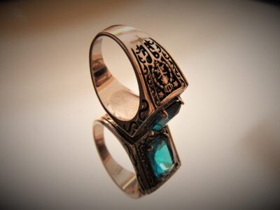 Designed Gold Ring With Emerald Studs